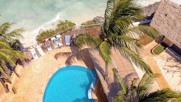 Outdoor pool, pool umbrellas, sun loungers