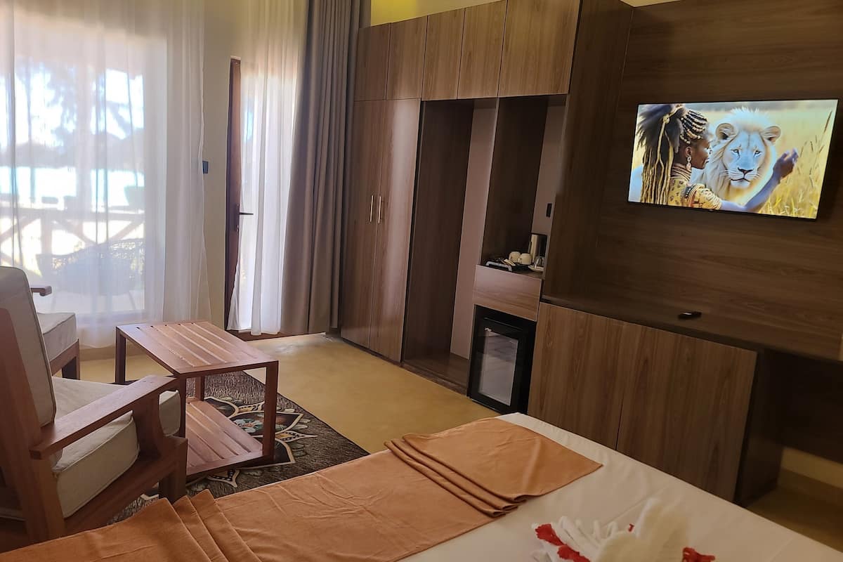 Habitación doble de lujo, frente al océano | Caja de seguridad en la habitación, muebles diferentes y escritorio