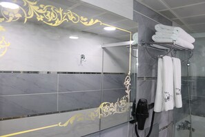 Shower, free toiletries, hair dryer, slippers