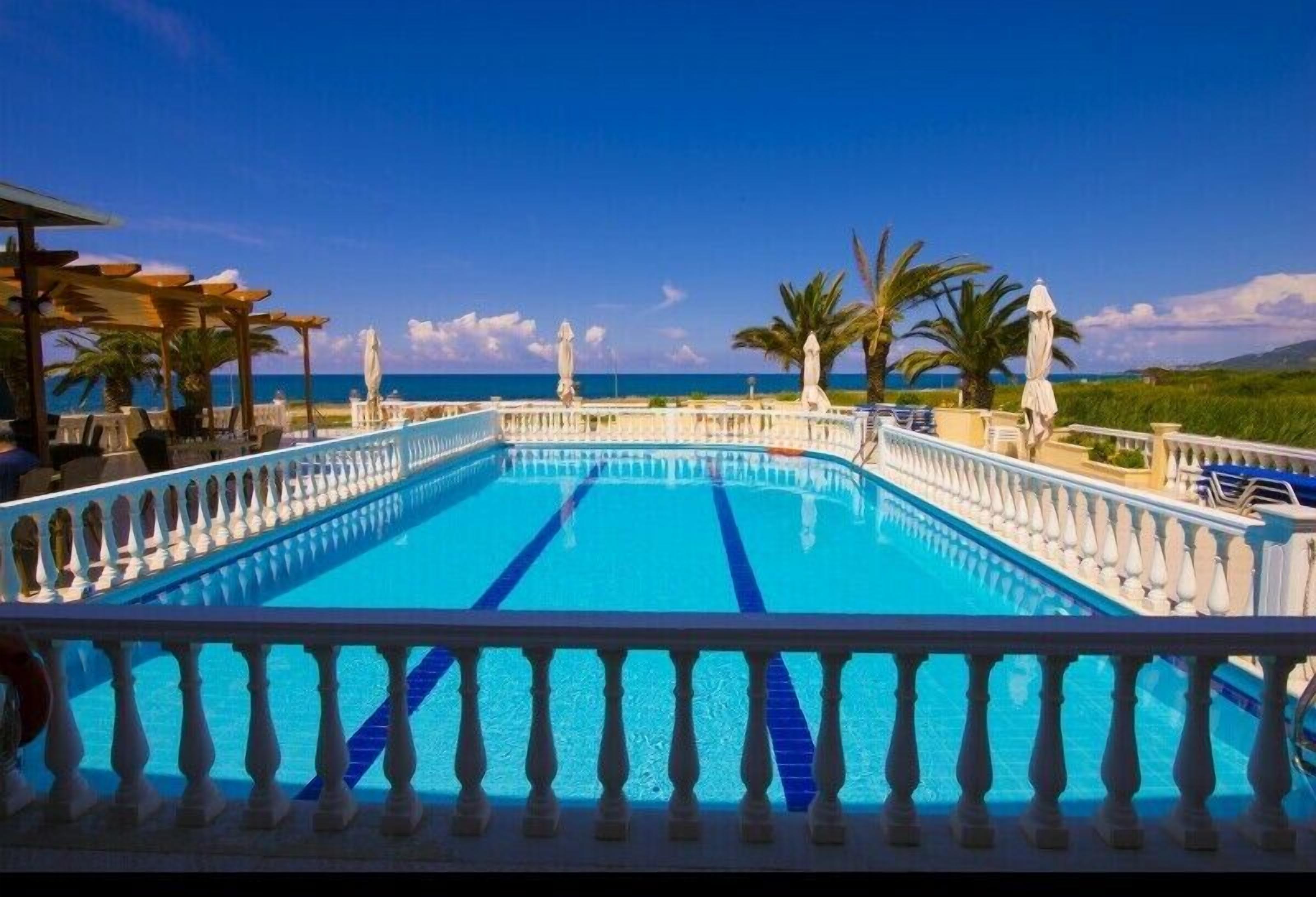 Outdoor pool, pool umbrellas, pool loungers