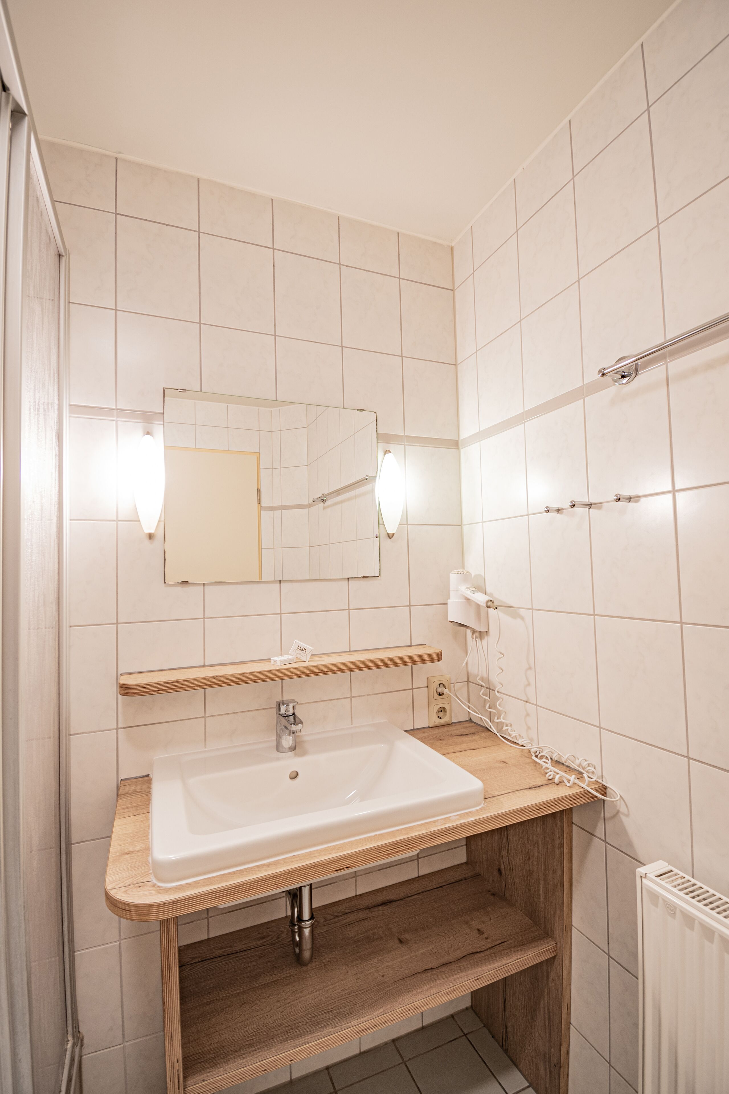 shower, free toiletries, hair dryer, towels