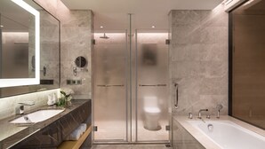A modern bathroom with a glass-enclosed shower, a large bathtub, and a vanity with dual sinks. - Holiday Inn Suzhou Taihu Lake by IHG (Suzhou)