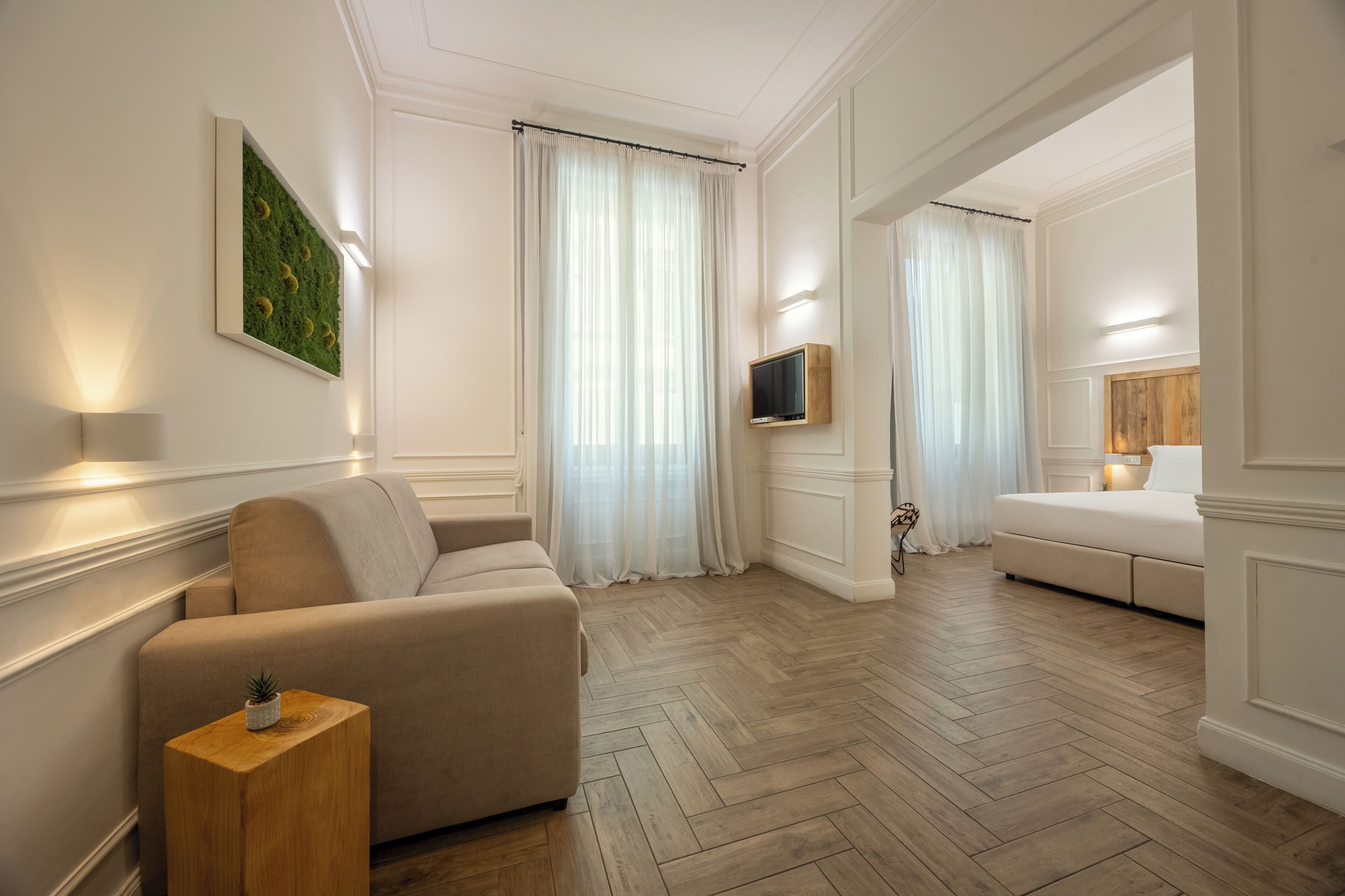 Suíte júnior | Área de estar | TV de tela plana 42 polegadas com canais via satélite, TV