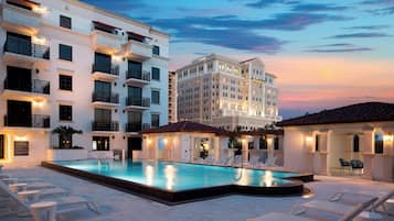 Outdoor pool, open 7:00 AM to 11:00 PM, free pool cabanas, pool loungers