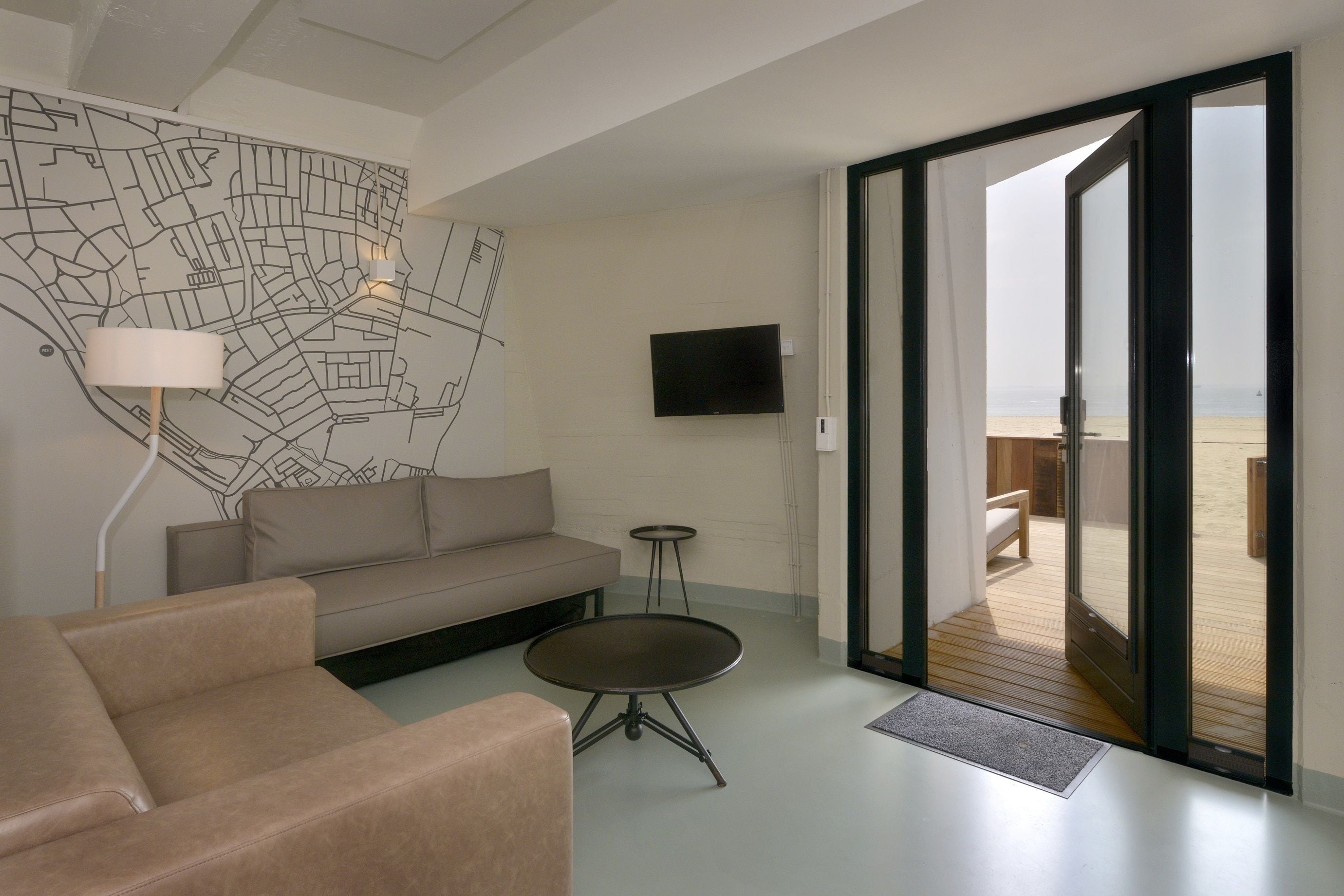 family apartment, beachfront | living area | led tv