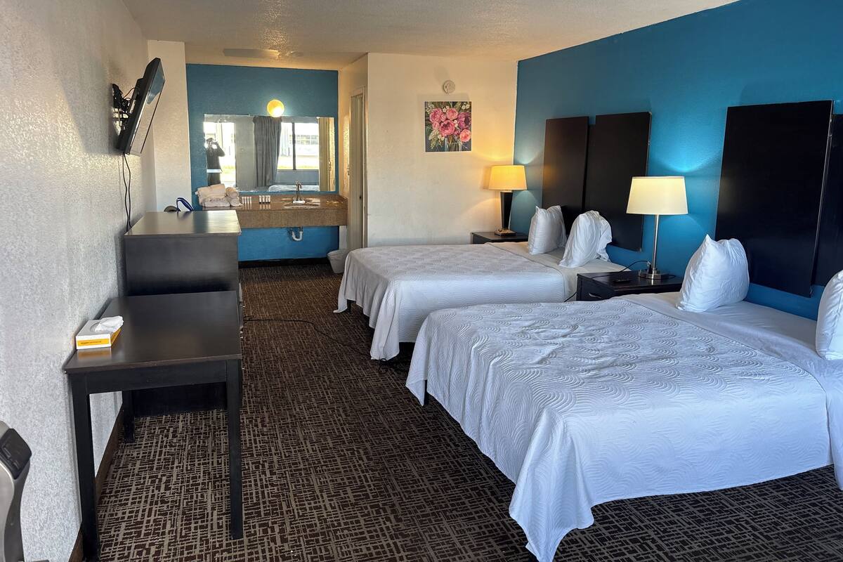 Premium bedding, memory foam beds, desk, blackout drapes