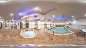 A large indoor swimming pool with a hot tub, seating area, and a view of the outside. - Comfort Inn & Suites Oklahoma City South I-35 (Oklahoma City)