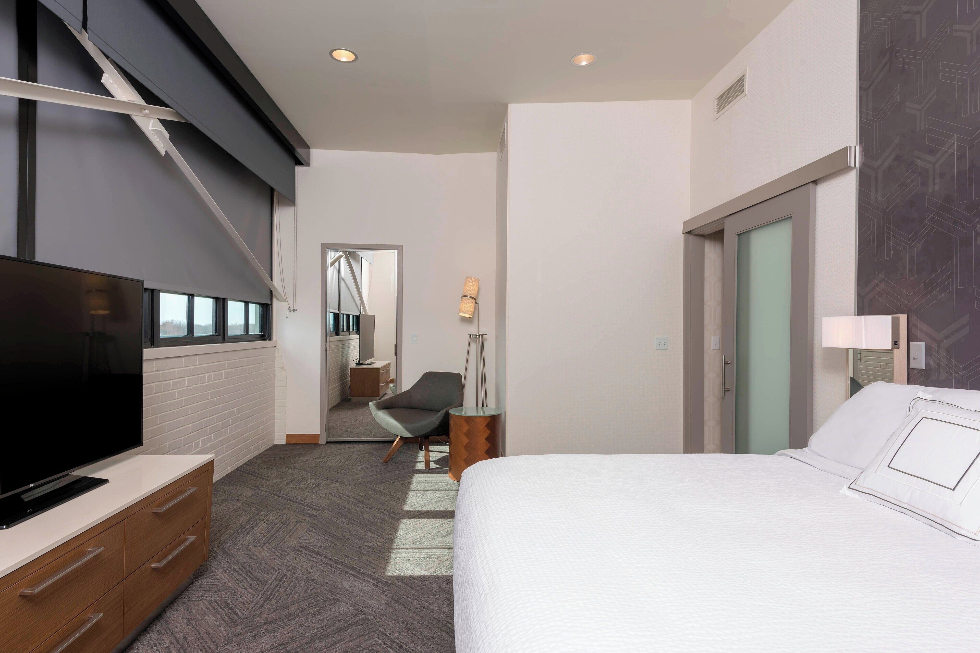 premium bedding, desk, laptop workspace, blackout curtains