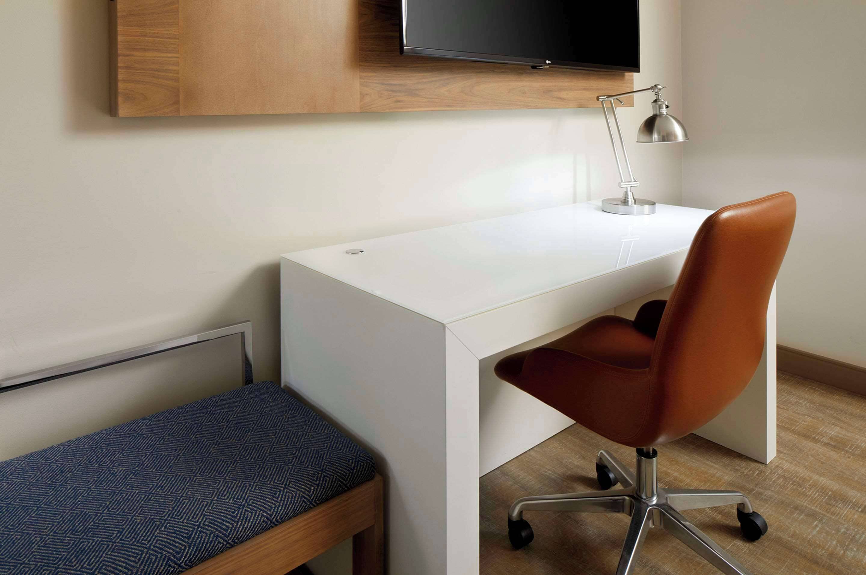 premium bedding, desk, laptop workspace, iron/ironing board