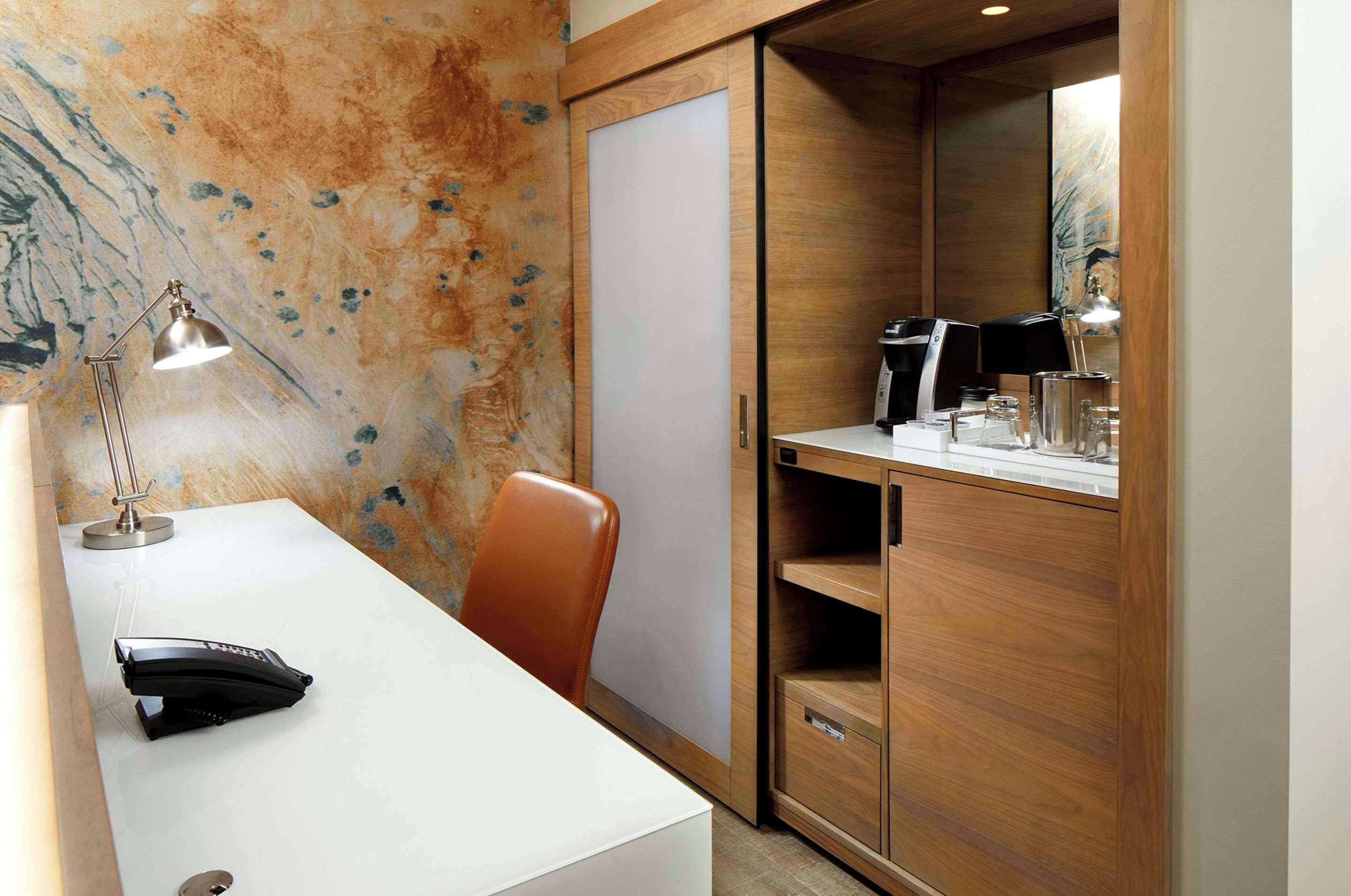 premium bedding, desk, laptop workspace, iron/ironing board