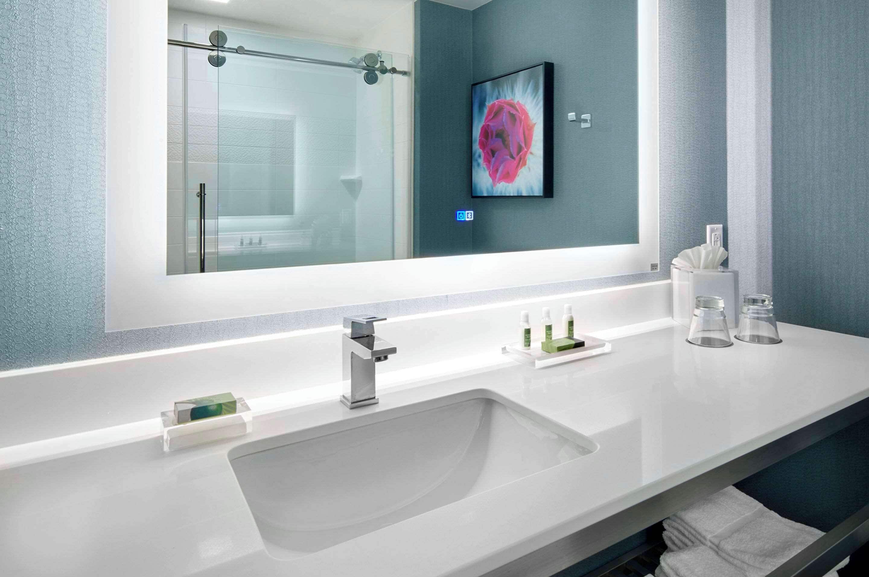 premium bedding, desk, laptop workspace, iron/ironing board