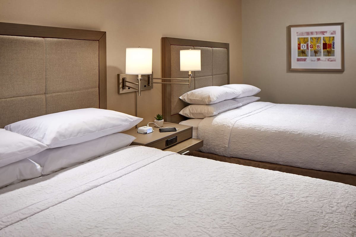 premium bedding, desk, laptop workspace, blackout curtains