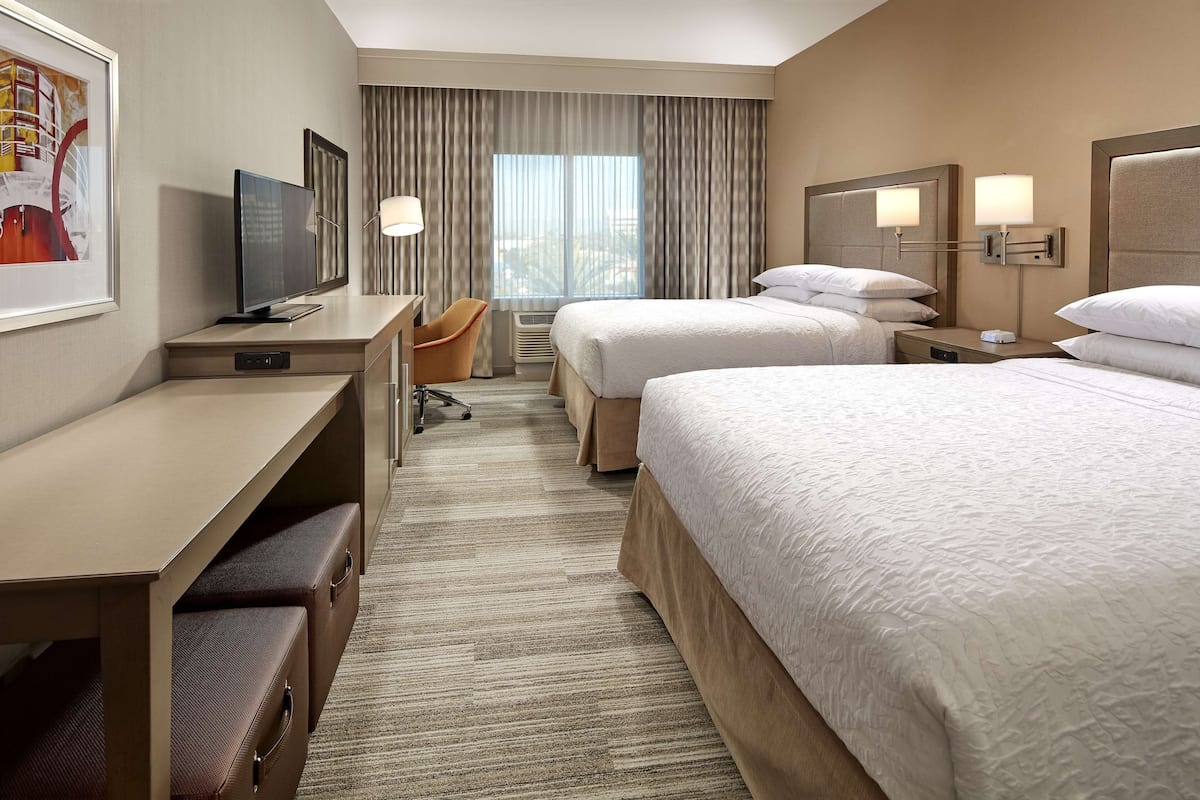 premium bedding, desk, laptop workspace, blackout curtains