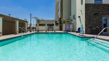 Outdoor pool, open 6 AM to 10 PM, sun loungers
