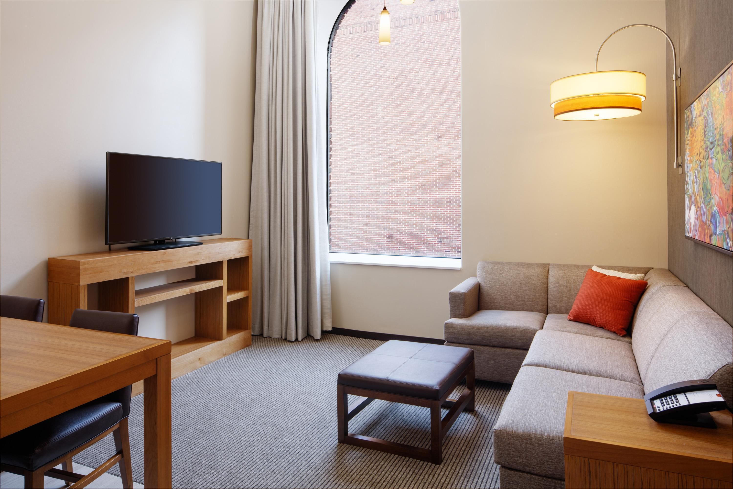 desk, laptop workspace, blackout curtains, iron/ironing board