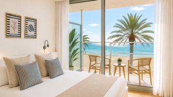 Habitación doble, vistas al mar | Edredones de plumas, minibar, caja fuerte y escritorio