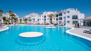 Outdoor pool, pool umbrellas, sun loungers