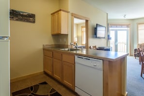 Luxury Condo, 2 Bedrooms (Sunstone #329) | Private kitchen | Fridge, microwave, stovetop, dishwasher