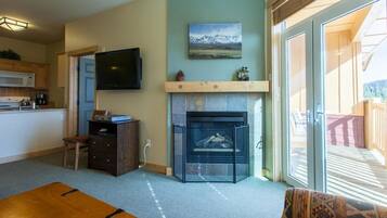 LCD TV, fireplace, DVD player