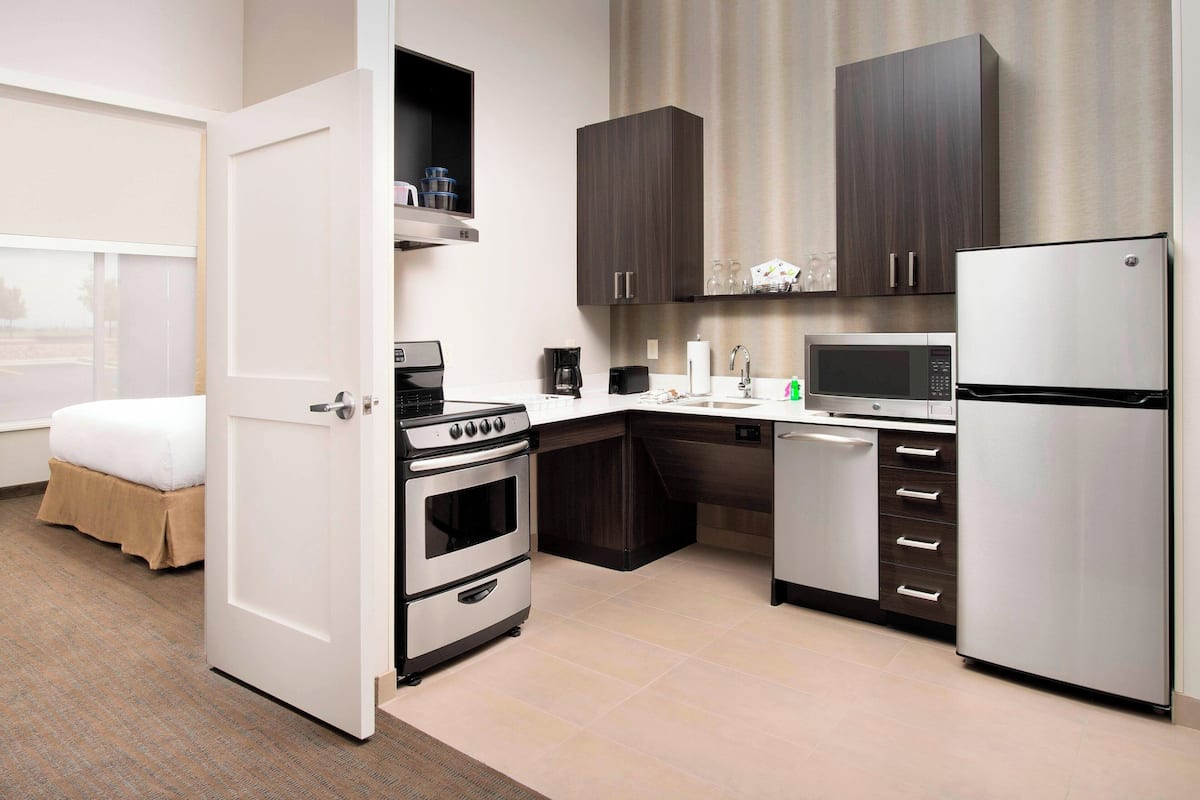 desk, laptop workspace, blackout curtains, iron/ironing board