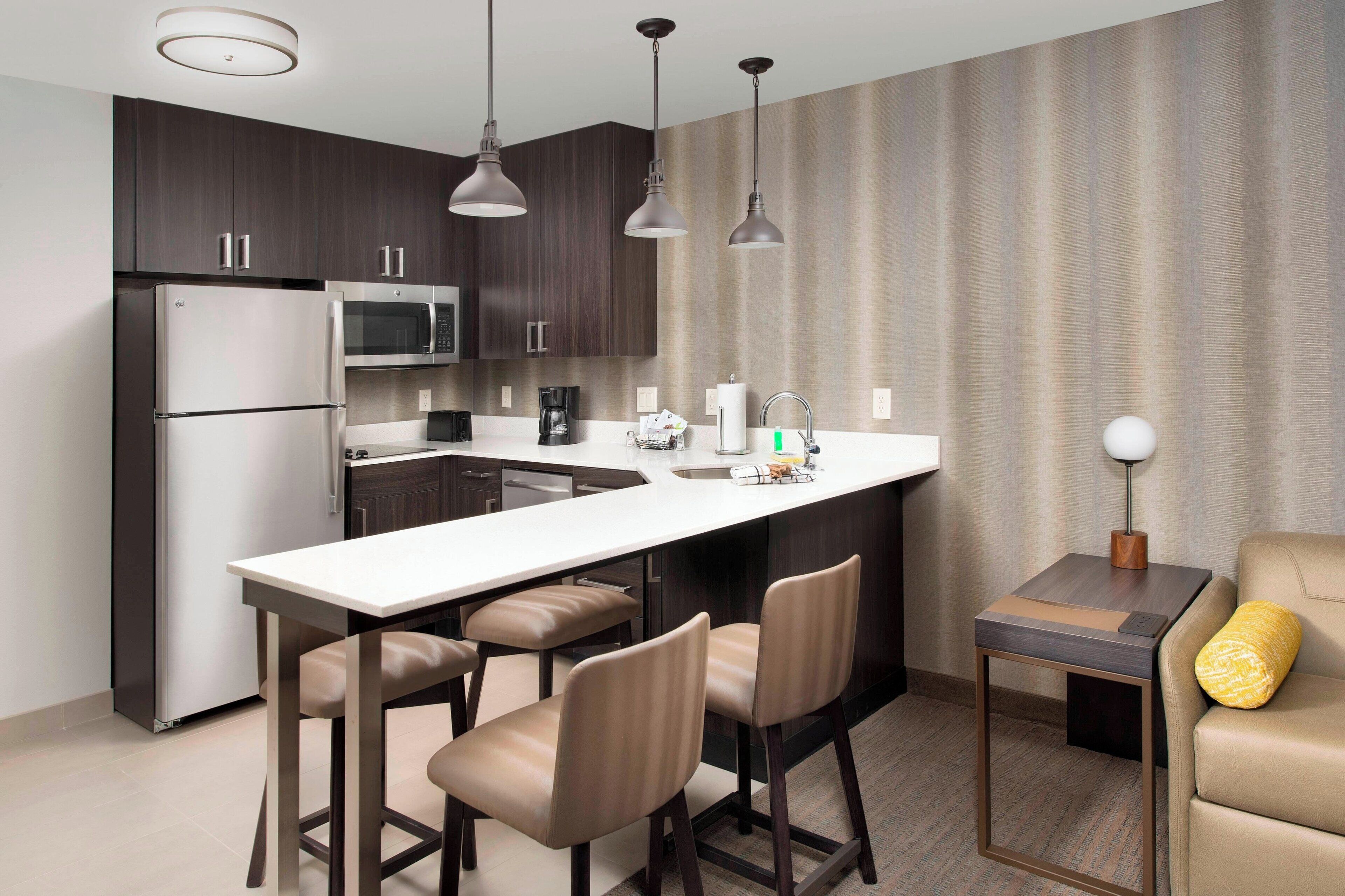 full-sized fridge, microwave, stovetop, dishwasher