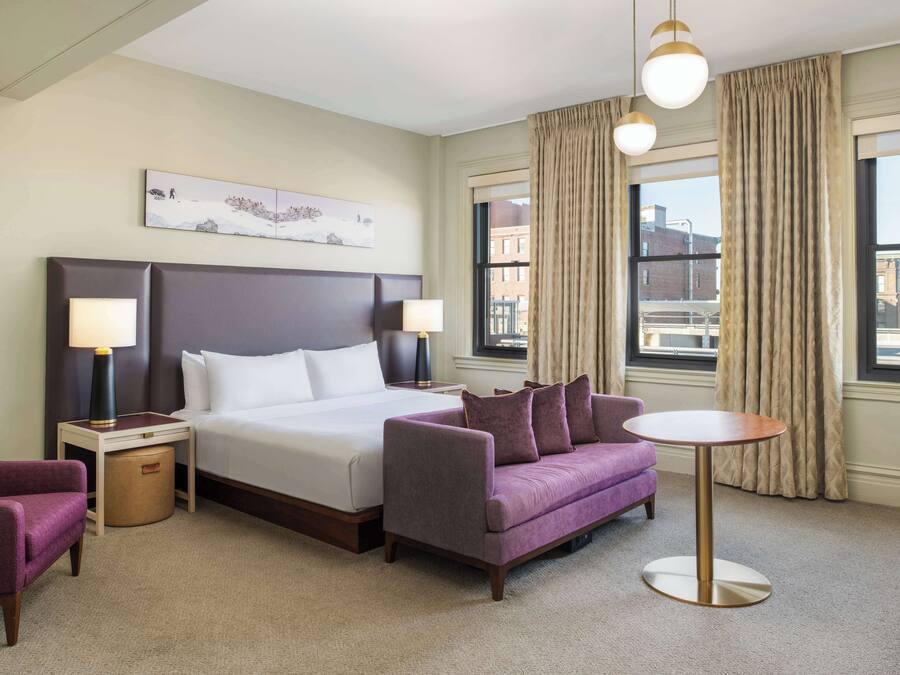 Deluxe Room, 1 King Bed, City View | Living area | 42-inch flat-screen TV with cable channels, TV