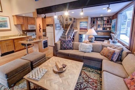 Townhome, 2 Bedrooms, Mountain View (Chamonix #92) | Living room | Flat-screen TV, fireplace, DVD player, foosball