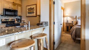 Condo, 2 Bedrooms, Mountain View (Juniper Springs Lodge #413) | Private kitchen | Fridge, microwave, stovetop, dishwasher