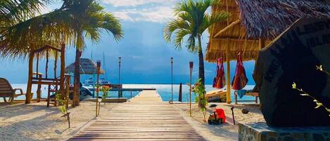 On the beach, sun-loungers