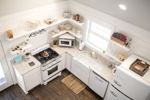 The Quarter House Cottage | Private kitchen | Full-sized fridge, microwave, oven, coffee/tea maker