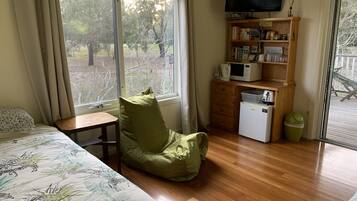 Family Room, Garden View | Individually decorated, individually furnished, iron/ironing board