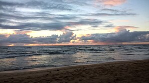 On the beach, sun loungers, beach towels