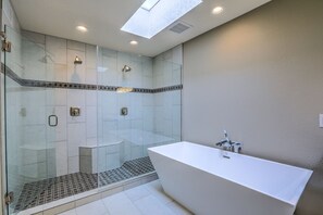Combined shower/tub, hair dryer, towels, soap