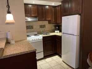 Full-sized fridge, microwave, oven, stovetop - Oak Square 205 is a spacious 2BR condo in downtown Gatlinburg (Gatlinburg)