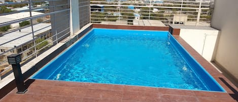 Outdoor pool, sun loungers