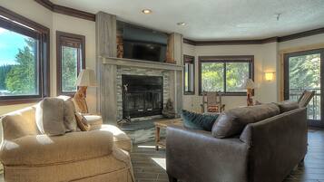 House, Multiple Beds (Southern Comfort - 3 BR Condo) | Living room | Flat-screen TV, fireplace