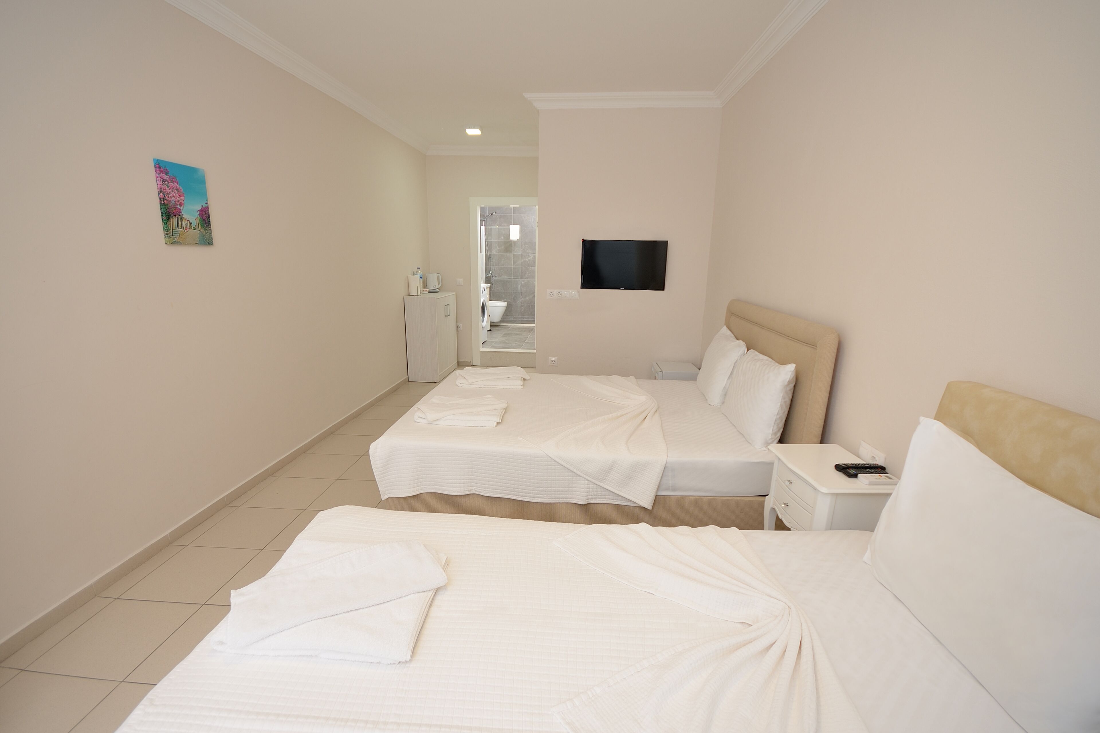 economy room, balcony | premium bedding, desk, iron/ironing board, free wifi