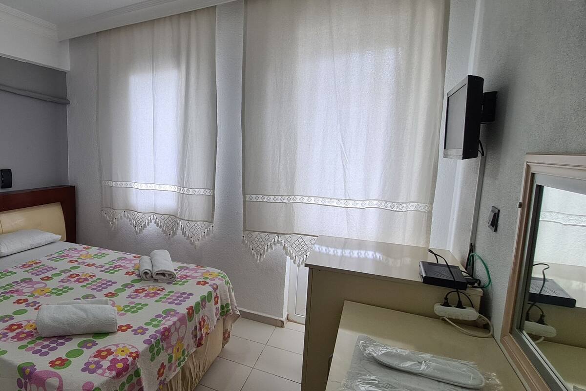 Desk, laptop workspace, iron/ironing board (on request), WiFi (free)