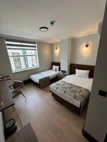 Standard Iki Tek Kisilik Yatakli Oda | Minibar, in-room safe, desk, laptop workspace