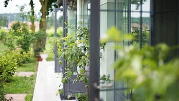 Standard Triple Room, Garden View | Cots/infant beds, free WiFi, bed sheets