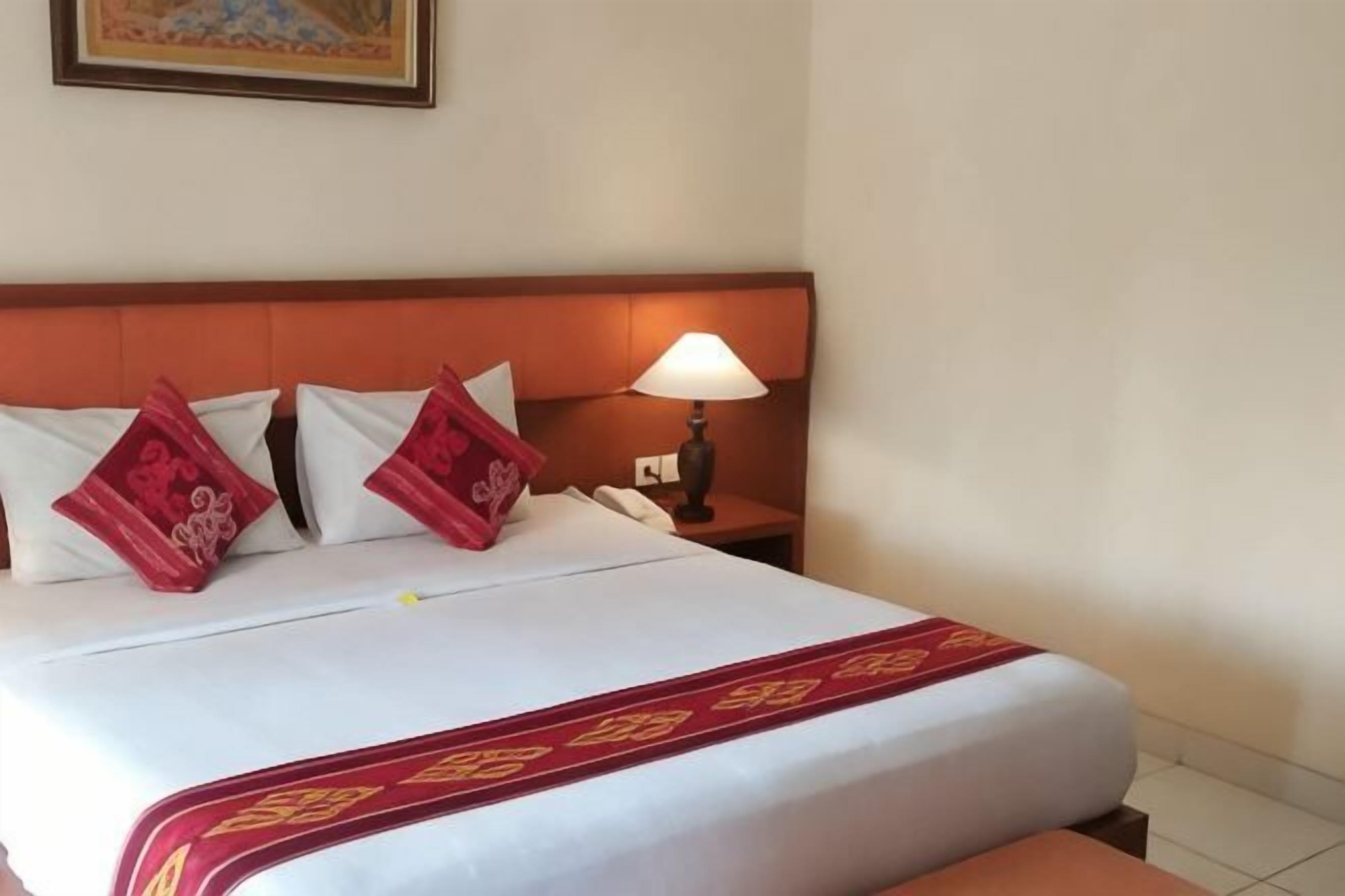 Luxe beddengoed, een minibar, een kluis op de kamer, een bureau