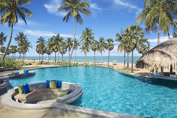 Outdoor pool, open 8:00 AM to 7:00 PM, pool umbrellas, sun loungers - Jetwing Surf & Safari, A Luxury Reserve (Pottuvil)