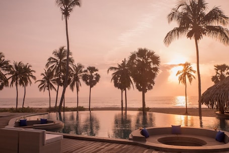 Outdoor pool, open 8:00 AM to 7:00 PM, pool umbrellas, sun loungers