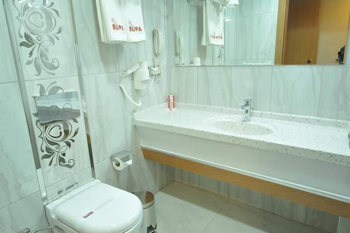 shower, free toiletries, slippers, towels