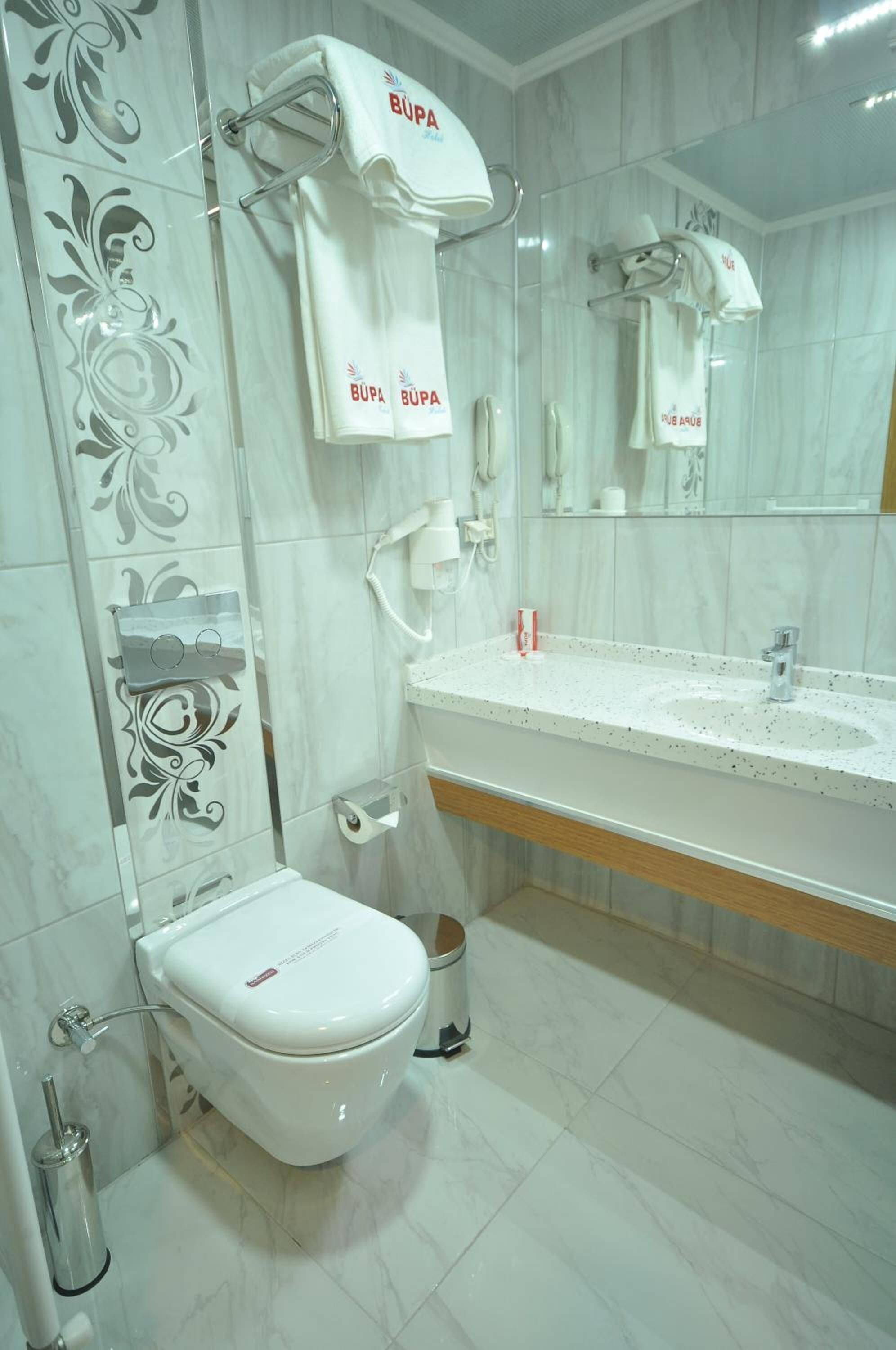 shower, free toiletries, slippers, towels