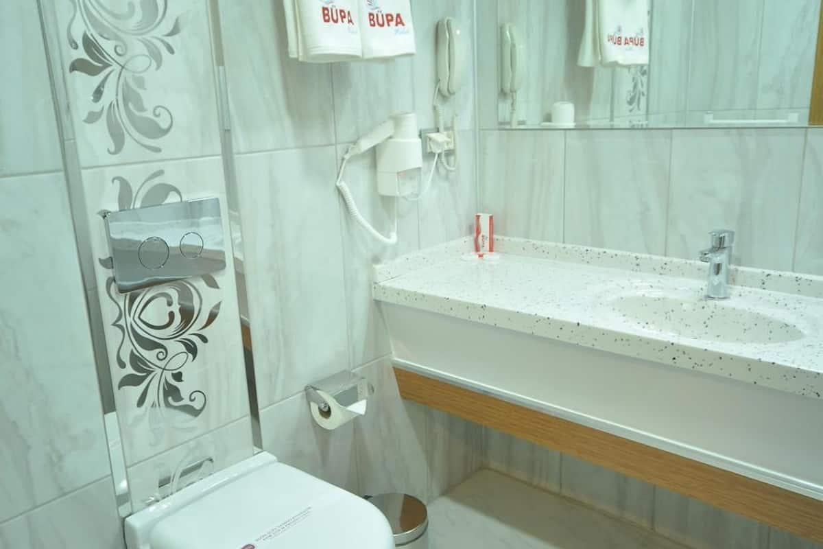 shower, free toiletries, slippers, towels