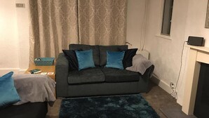 Departamento Deluxe, 2 habitaciones | Sala de estar