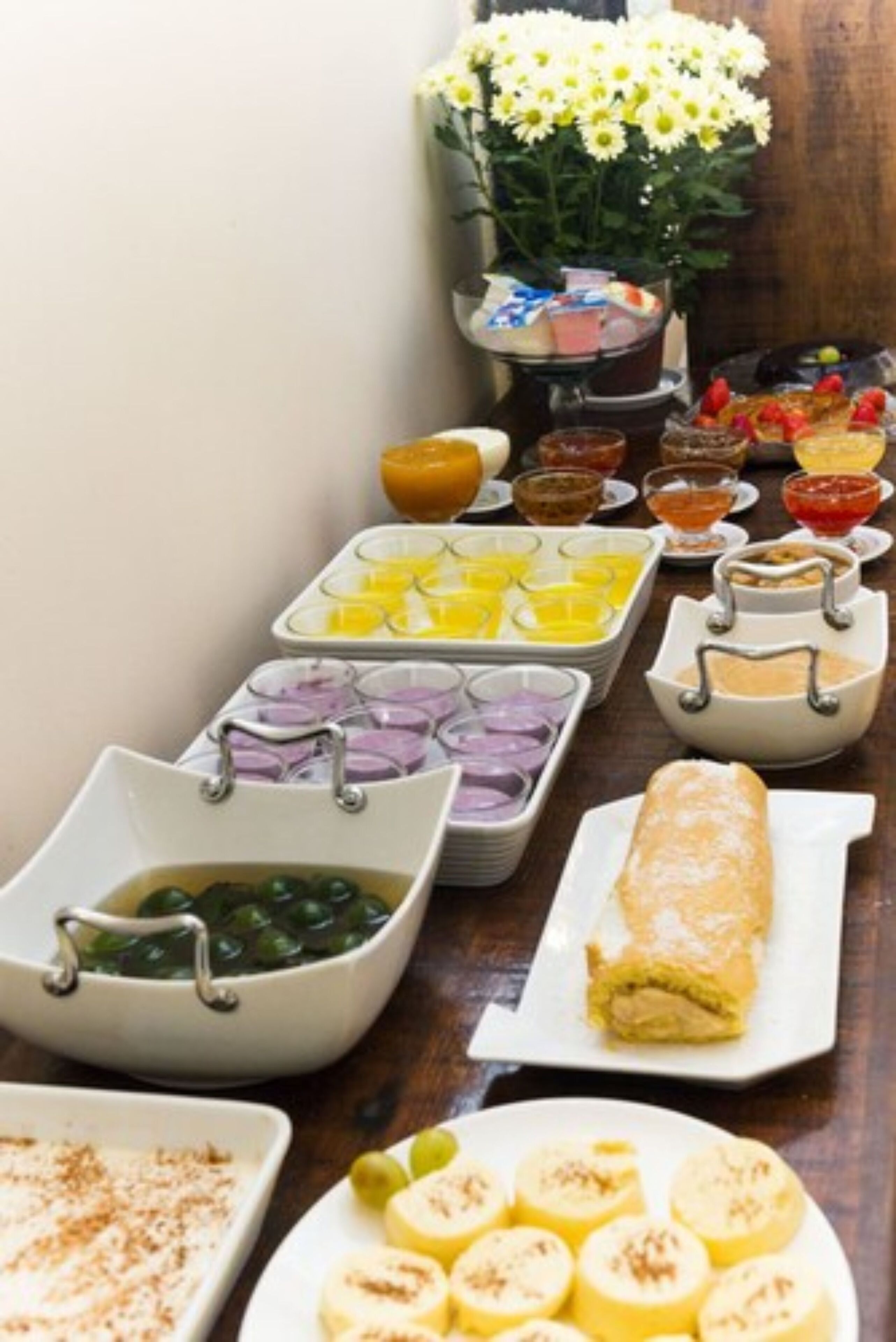 A breakfast buffet with various food items and beverages.