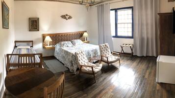 Superior Suite, 1 Queen Bed | Minibar, in-room safe, individually decorated, desk