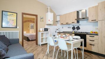 Appartement, 1 chambre | Coin séjour | Télévision à écran plat